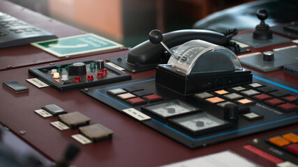 Ship's control bridge dashboard with navigation equipment on the vessel bridge.