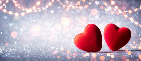 Wall Mural - two hearts in love on silver glitter with abstract defocused background