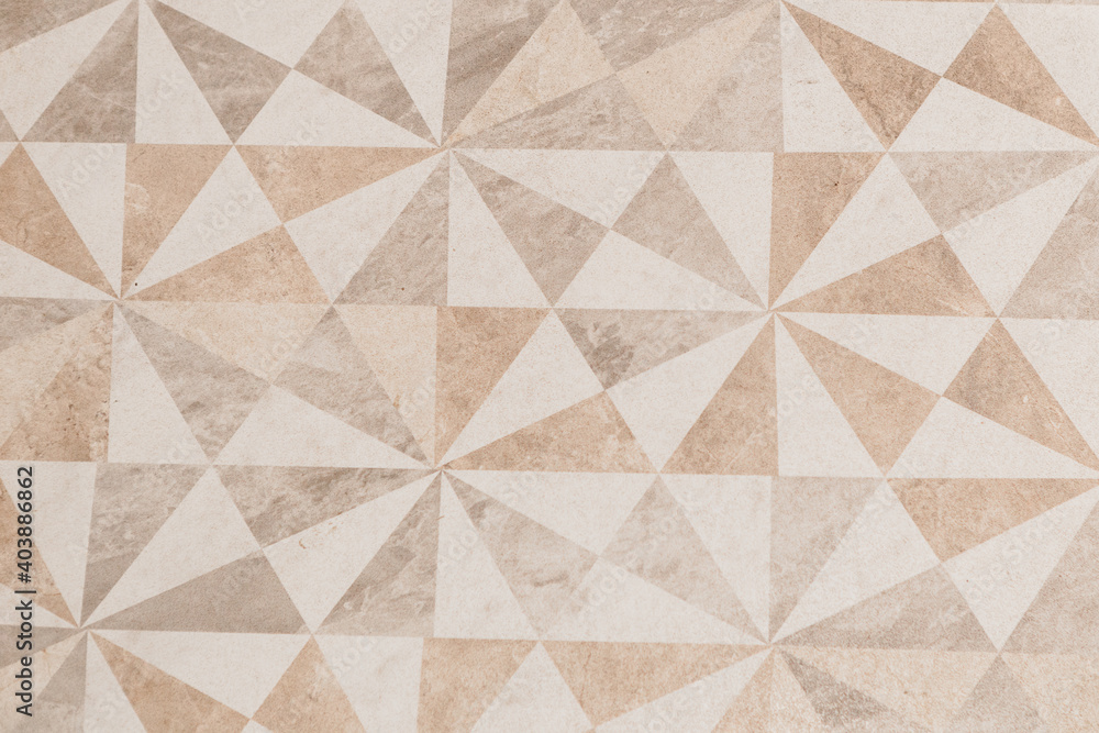 pattern of triangular drawings of different colors. Floor texture with triangular patterns