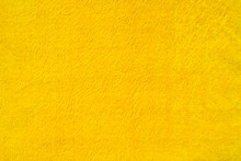 Close-up Light Yellow Suede Fabric Velvet Texture.