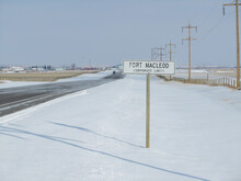 Closeup Of A Traffic Sign At The Fort Macleod, Alberta, Canada During Winter