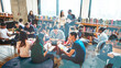 © Rawpixel.com - Group of diverse students working in a school library