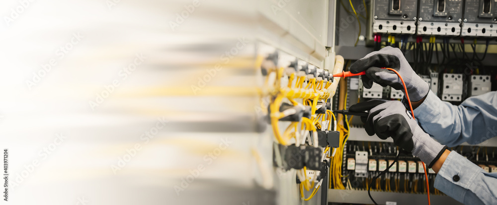 Electrical engineers test electrical installations and wiring on ...