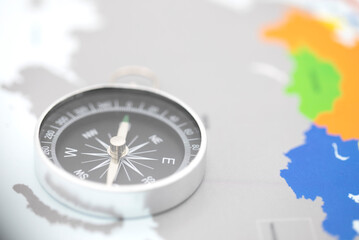 compass with map in background