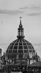 Poster - Grayscale shot of the church tower on the grey sky background