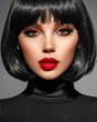 © Valua Vitaly - Beautiful brunette girl with red lips and black bob hairstyle. Pretty young woman with black hair. Closeup portrait of a model with bright makeup on a face. Fashion portrait of a pretty lady.