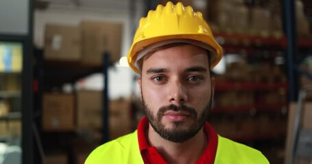 Sticker - Young worker man inside delivery boxes warehouse - Industry and logistics concept