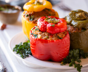 Wall Mural - Bell peppers with meat and parsley , stuffed vegetables