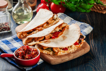 Wall Mural - Mexican Quesadilla with chicken, sausage chorizo and red pepper