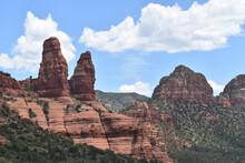 Breathtaking View Of Majestic Red Rock Mountains In Sedona, Arizona With Cloud Patterns In The Sky