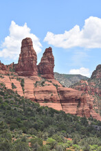 Breathtaking View Of Majestic Red Rock Mountains In Sedona, Arizona With Cloud Patterns In The Sky