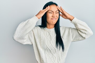 Poster - Beautiful hispanic woman wearing casual winter sweater over white background with hand on head, headache because stress. suffering migraine.