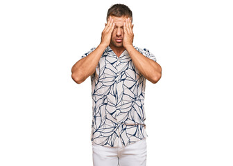 Wall Mural - Handsome muscle man wearing casual clothes suffering from headache desperate and stressed because pain and migraine. hands on head.