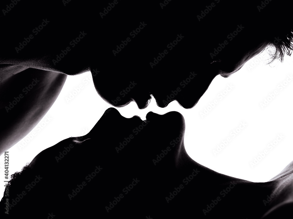 Close-up Of Couple Kissing Against Wall - obrazy, fototapety, plakaty 