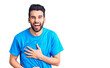 © Krakenimages.com - Young handsome man with beard wearing casual t-shirt smiling and laughing hard out loud because funny crazy joke with hands on body.