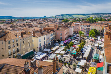 Wall Mural - View over the town of Issoire (Auvergne, France), the market square and the surrounding hills from the belvedere of the clock tower, a 15th century belfry 