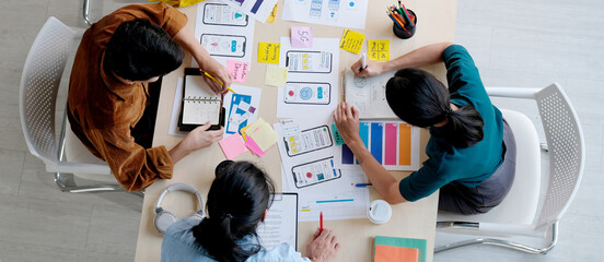 Wall Mural - brainstorm planing creative asian teamwork, group of asia mobile phone app developer team meeting fo