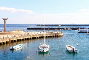 Wall Mural - The marina at Atami City in Shizuoka Prefecture in Japan. Atami is an historical seaside resort for people living in Tokyo with sandy beaches and hot springs.