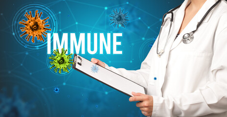 doctor prescribes a prescription with IMMUNE inscription, pandemic concept