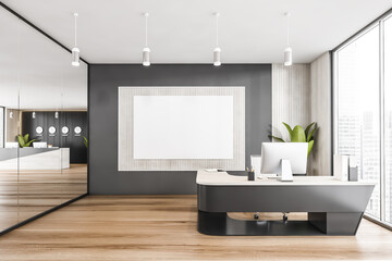 Mockup canvas in wooden and black office room with table and computer