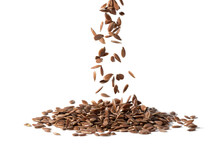 Close Up Of Linseeds Or Flax Seeds Falling Down In A Pile And Isolated On White Background