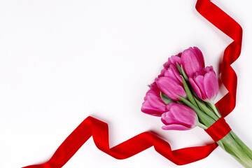 Wall Mural - Tulip flowers and ribbon on white