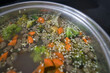 Ein Topf Gemüsesuppe, Hühnersuppe mit Karotten, Leberknödel, Brokkoli und Bio Gemüse, Suppentopf nach Omas Hausmittel
