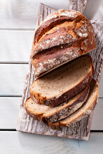Sliced Rye Bread On Cutting Board, Closeup..