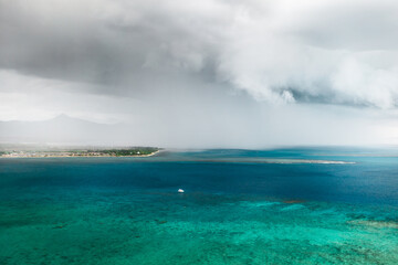 A thunderstorm approaching the coast of the island of Mauritius in the Indian Ocean