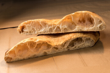 Sticker - Baked focaccia - bread of sourdough - Close up of cut loaf showing the alveoli as test of gluten strengthe