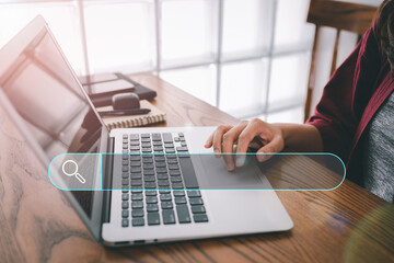 Leinwandbilder - Searching Browsing Internet Data Information with blank search bar.Search Engine Optimization SEO Networking Concept.hand of woman working with computer laptop on desk in office.