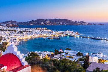 Wall Mural - Mykonos, Greece. Panoramic view of Mykonos town, Cyclades islands at sunset.
