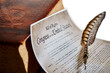 Bill of Rights amendments with Vintage Book and a Quill Pen