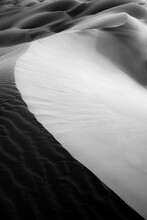 Sand Dunes In Wave Form On The Desert