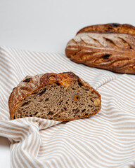 Fresh loaves of bread on a white table