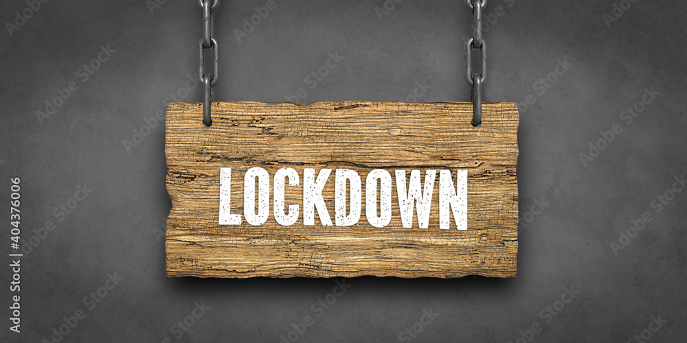 .wooden sign on chains with message LOCKDOWN in front of concrete background - obrazy, fototapety, plakaty 