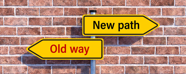 Wall Mural - street signs pointing in different directions with the message NEW PATH and OLD WAY in front of a brick wall background