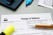  Financial concept meaning Form 8822 Change of Address with sign on the piece of paper.