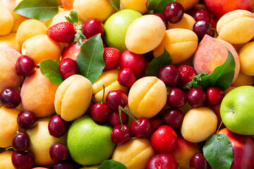 Wall Mural - fresh fruits and berries as background, top view