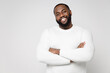 © ViDi Studio - Handsome attractive smiling cheerful young african american man 20s wearing casual basic sweater standing holding hands crossed looking camera isolated on white color wall background studio portrait.