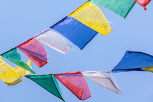 Low Angle View Of Colorful Textiles Hanging Against Clear Sky