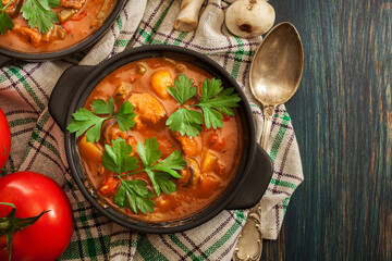 Wall Mural - Stew soup with meat, potatoes, mushrooms and red pepper