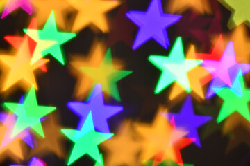 Wall Mural - colorful stars illumination for holiday or abstract boke background