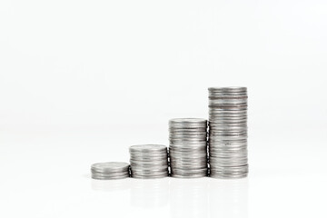 Columns of coins on a light background. Metallic currency. Money.