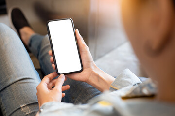 cell phone blank white screen mockup.woman hand holding texting using mobile on desk at office.background empty space for advertise.work people contact marketing business,technology