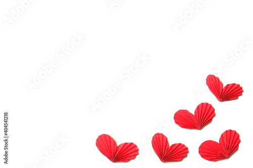 Few handmade red accordion folded paper hearts on white background isolated. Love, Valentine's, mother's, women's day, relations, wedding, romantic template copy space