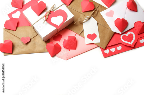 Composition from several red paper hearts on white background isolated. Love, Valentine's, mother's, women's day, relations, wedding, romantic offer, card, invitation, template copy space 