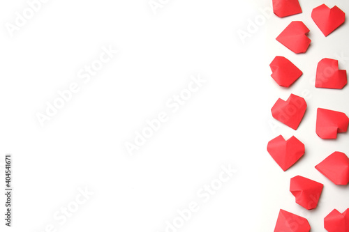 Composition from several handmade 3D red paper hearts on white background isolated. Love, Valentine's, mother's, women's day, relations, wedding, romantic template copy space 