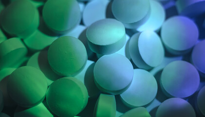 Fototapete - Pills or drugs in a package under neon light. Beautiful background pattern for design.