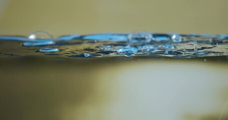 Wall Mural - Air bubbles and water waves. Slow motion.